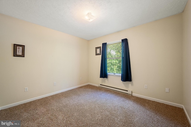 108 Oakmont Cir, Winchester, VA 22602 - carpeted empty room with baseboard heating and a textured ceiling