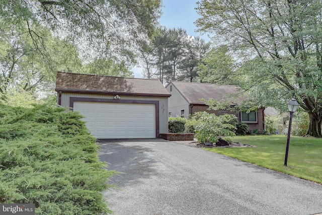 2205 Pecan Ln, Bowie, MD 20716 - view of front of property with driveway, a front yard, a shingled roof, and brick siding
