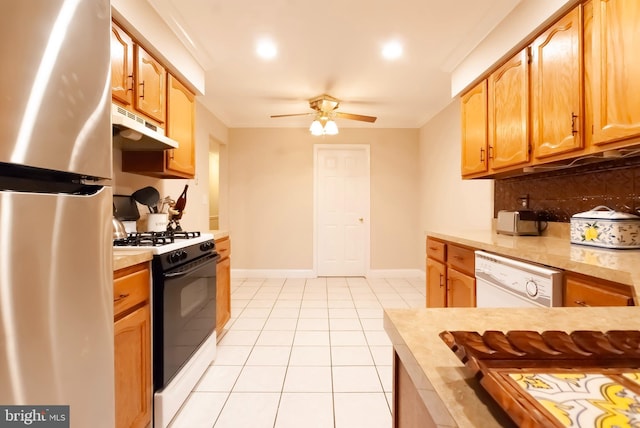 20 Kennebec Ct, Bordentown, NJ 08505 - kitchen featuring freestanding refrigerator, white dishwasher, under cabinet range hood, black gas range, and light countertops