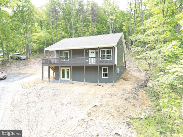 230 Spring Hollow Rd, Front Royal, VA 22630 - view of front of property featuring a deck, a forest view, and french doors