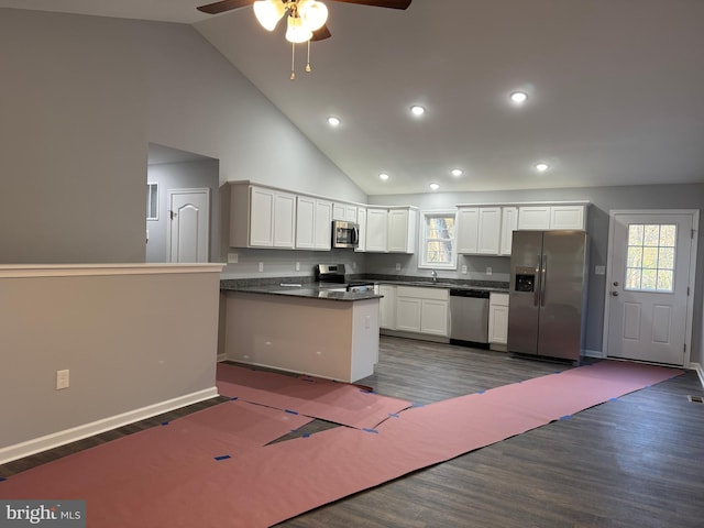 230 Spring Hollow Rd, Front Royal, VA 22630 - kitchen featuring stainless steel appliances, dark countertops, ceiling fan, dark wood-type flooring, and high vaulted ceiling