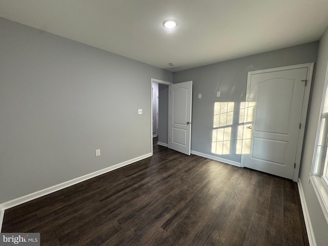 230 Spring Hollow Rd, Front Royal, VA 22630 - unfurnished bedroom with dark wood finished floors and baseboards