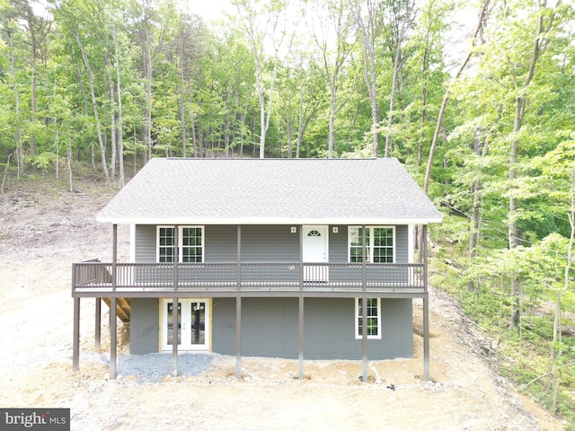 230 Spring Hollow Rd, Front Royal, VA 22630 - view of front of house featuring a wooden deck, roof with shingles, french doors, and a view of trees