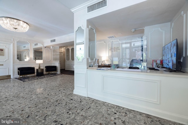 1301 N Harrison St Unit 1108, Wilmington, DE 19806 - living room featuring crown molding and a chandelier