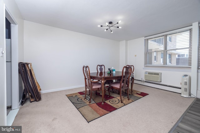 1301 N Harrison St Unit 1108, Wilmington, DE 19806 - dining area with a baseboard radiator, a chandelier, an AC wall unit, and baseboards