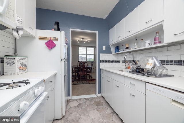 1301 N Harrison St Unit 1108, Wilmington, DE 19806 - kitchen with white appliances, a sink, open shelves, white cabinetry, and decorative backsplash