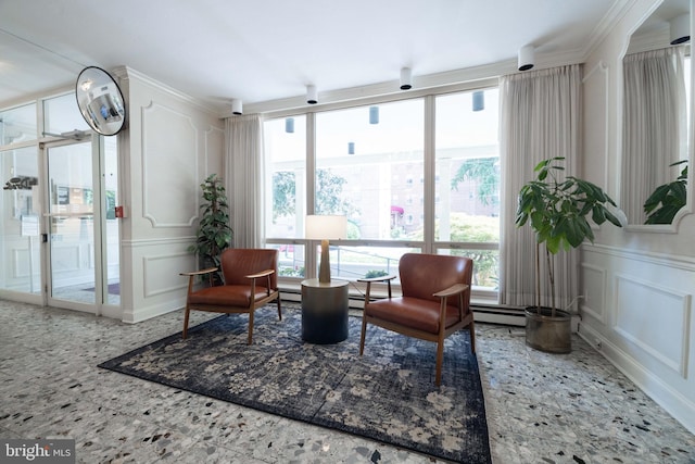 1301 N Harrison St Unit 1108, Wilmington, DE 19806 - sitting room featuring a decorative wall, plenty of natural light, and crown molding