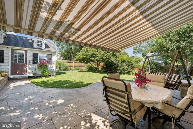 2606 Caroline St, Fredericksburg, VA 22401 - view of patio with outdoor dining area and an outdoor structure