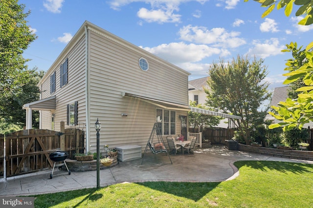 2606 Caroline St, Fredericksburg, VA 22401 - rear view of house featuring a patio