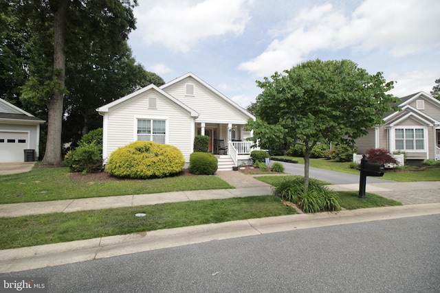 32530 Approach Unit 3252, Long Neck, DE 19966 - view of front of home with covered porch and a front yard