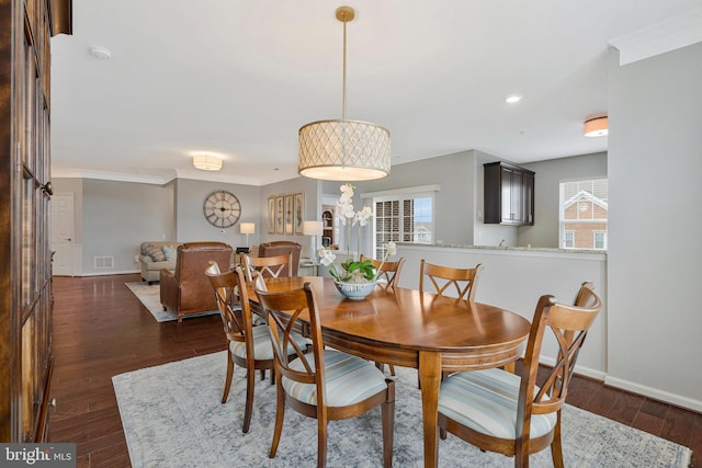 20620 Hope Spring Ter Unit 401, Ashburn, VA 20147 - dining space with baseboards, dark wood-style flooring, recessed lighting, and crown molding