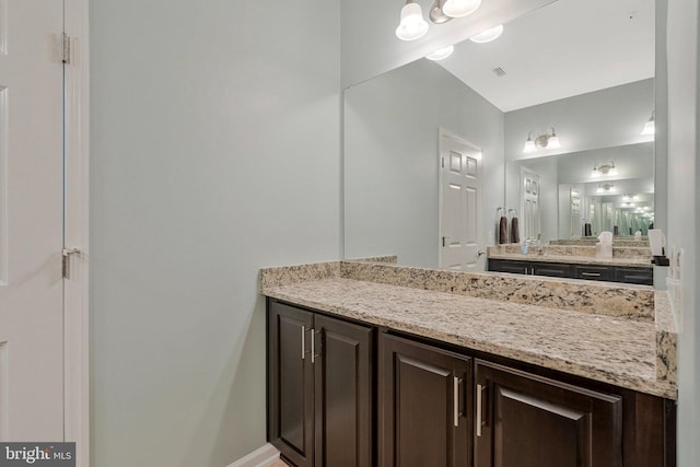 20620 Hope Spring Ter Unit 401, Ashburn, VA 20147 - bathroom with vanity and baseboards