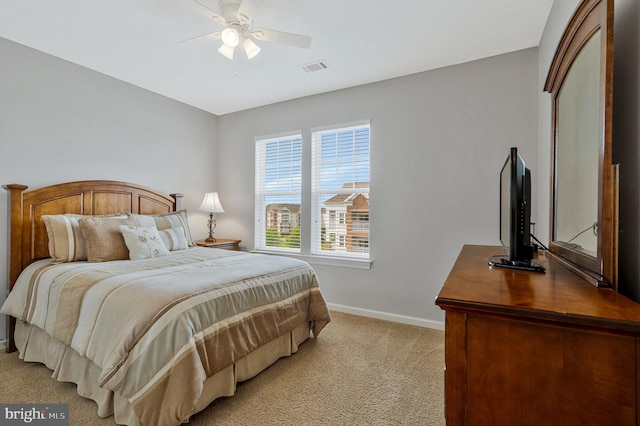 20620 Hope Spring Ter Unit 401, Ashburn, VA 20147 - bedroom with light carpet, baseboards, and a ceiling fan