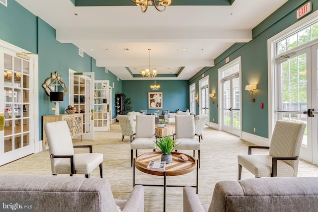 20620 Hope Spring Ter Unit 401, Ashburn, VA 20147 - living area with french doors, a chandelier, baseboards, beamed ceiling, and recessed lighting