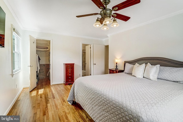 5901 Wivenhoe Ct, Alexandria, VA 22315 - bedroom with light wood finished floors, ornamental molding, baseboards, a walk in closet, and ceiling fan