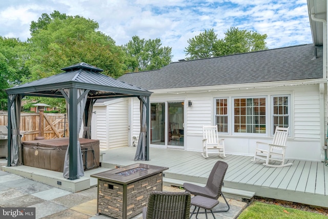 5901 Wivenhoe Ct, Alexandria, VA 22315 - wooden terrace with an outdoor fire pit, a gazebo, a hot tub, and a patio area