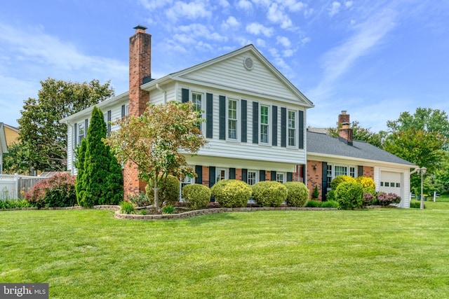 5901 Wivenhoe Ct, Alexandria, VA 22315 - view of front facade featuring a chimney, an attached garage, and brick siding