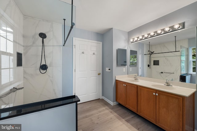 101 Glencoe Ct, Newark, DE 19702 - full bathroom with a marble finish shower, wood finished floors, and double vanity