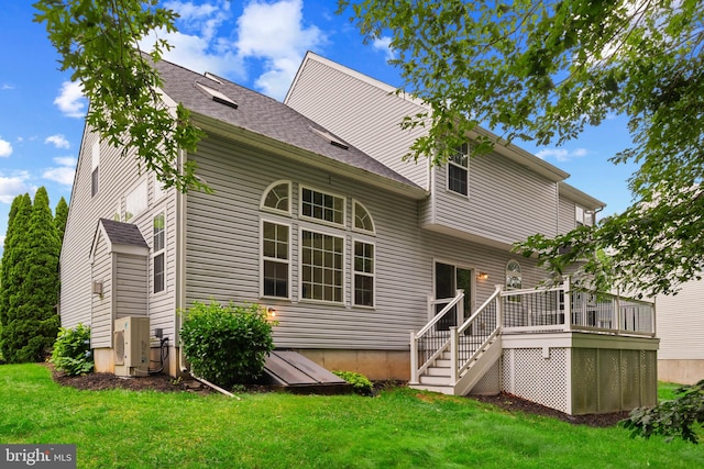 101 Glencoe Ct, Newark, DE 19702 - back of property with a wooden deck, a lawn, and stairway