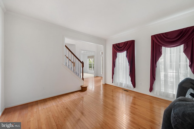 101 Glencoe Ct, Newark, DE 19702 - entryway featuring hardwood / wood-style flooring, stairs, ornamental molding, and baseboards
