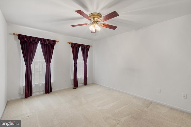 101 Glencoe Ct, Newark, DE 19702 - spare room featuring carpet floors, ceiling fan, and baseboards