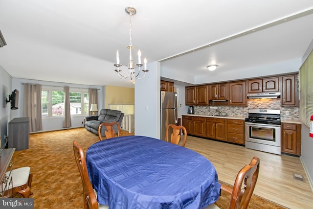 727 Fulton St S, Cherry Hill, NJ 08002 - dining room with a chandelier and light wood-type flooring