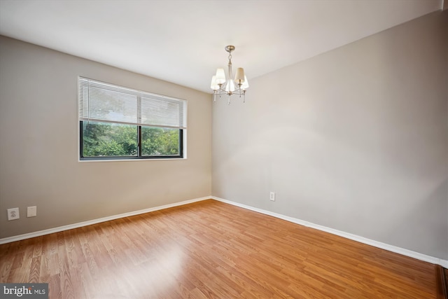 8601 Manchester Rd Unit 319, Silver Spring, MD 20901 - spare room with a chandelier and wood finished floors