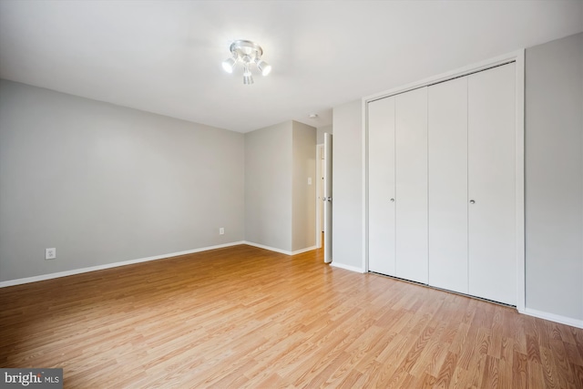 8601 Manchester Rd Unit 319, Silver Spring, MD 20901 - unfurnished bedroom featuring light wood-type flooring and a closet