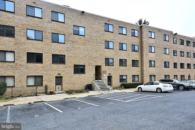 8601 Manchester Rd Unit 319, Silver Spring, MD 20901 - view of building exterior with uncovered parking