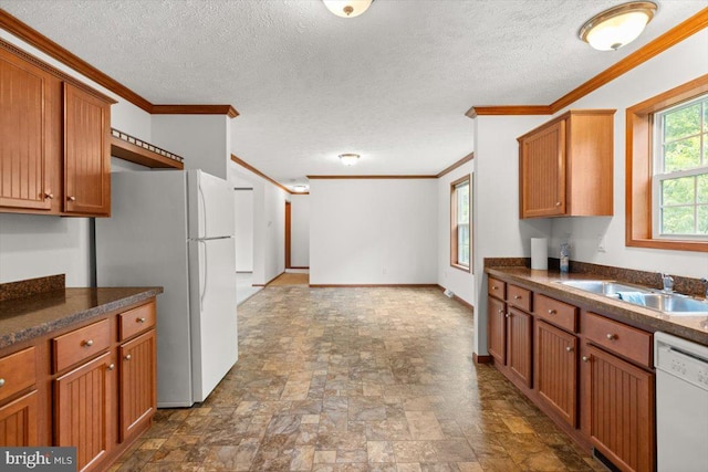 4767 S Ox Rd, Edinburg, VA 22824 - kitchen with white appliances, stone finish floors, ornamental molding, brown cabinets, and dark countertops