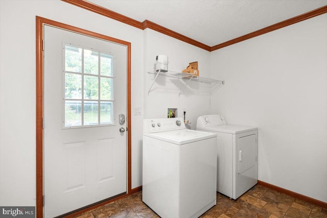 4767 S Ox Rd, Edinburg, VA 22824 - laundry area featuring crown molding, separate washer and dryer, stone finish floors, and a textured ceiling