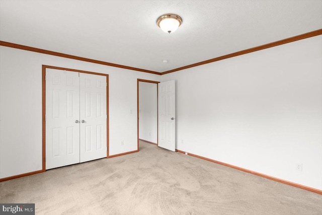 4767 S Ox Rd, Edinburg, VA 22824 - unfurnished bedroom featuring carpet flooring, a closet, and crown molding