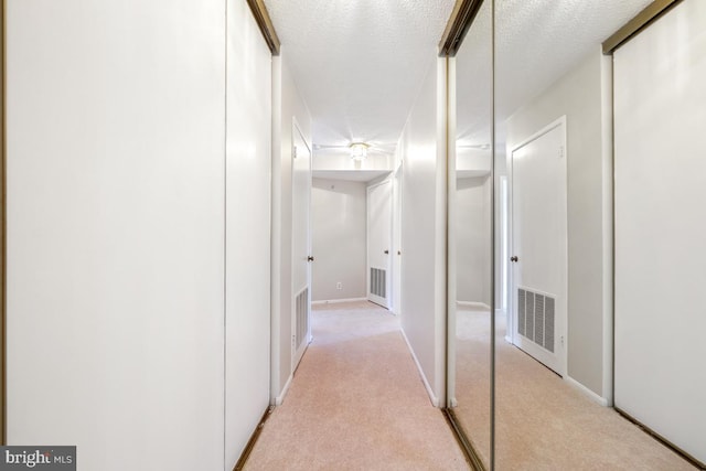5902 Mount Eagle Dr Unit 718, Alexandria, VA 22303 - corridor with light carpet and a textured ceiling