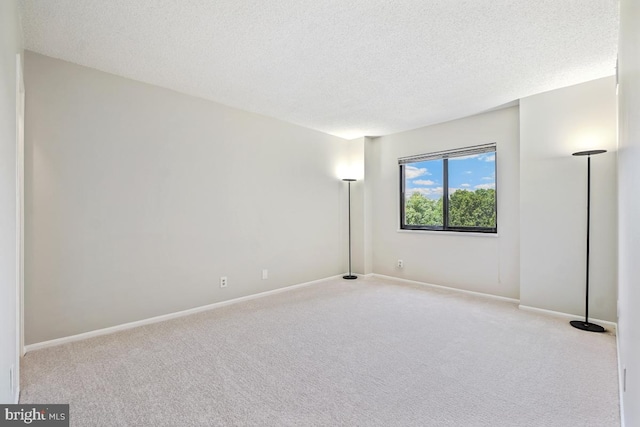 5902 Mount Eagle Dr Unit 718, Alexandria, VA 22303 - carpeted spare room with a textured ceiling
