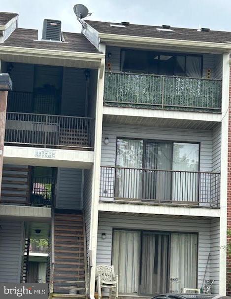 21 Kite Ct, Lawrenceville, NJ 08648 - view of building exterior with stairway and central air condition unit