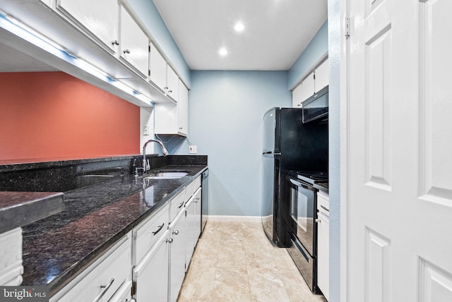 3315 Wyndham Cir Unit 1223, Alexandria, VA 22302 - kitchen featuring black appliances, a sink, white cabinetry, dark stone counters, and recessed lighting