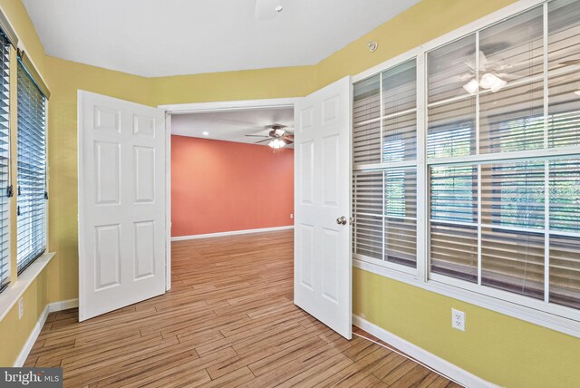 3315 Wyndham Cir Unit 1223, Alexandria, VA 22302 - empty room featuring a ceiling fan, baseboards, wood finished floors, and recessed lighting