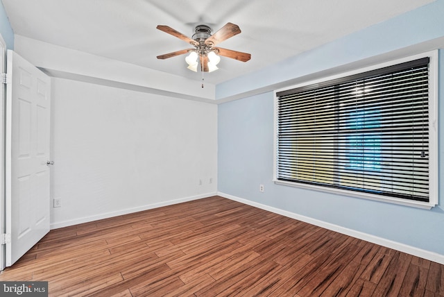 3315 Wyndham Cir Unit 1223, Alexandria, VA 22302 - unfurnished room with wood finished floors, ceiling fan, and baseboards