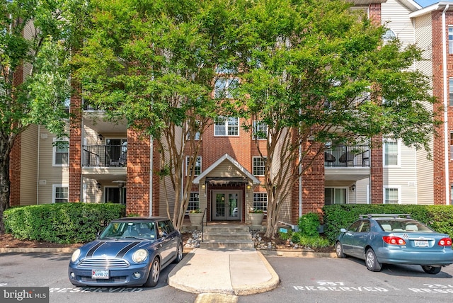 3315 Wyndham Cir Unit 1223, Alexandria, VA 22302 - view of property with uncovered parking