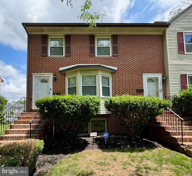 225 N New St, Dover, DE 19904 - multi unit property with brick siding and stairs