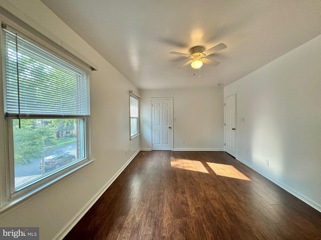 225 N New St, Dover, DE 19904 - unfurnished room featuring dark wood-type flooring and ceiling fan