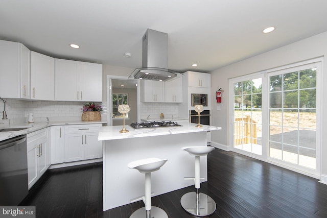 20 New St, Mullica Hill, NJ 08062 - kitchen with appliances with stainless steel finishes, island range hood, dark wood-style floors, white cabinets, and recessed lighting