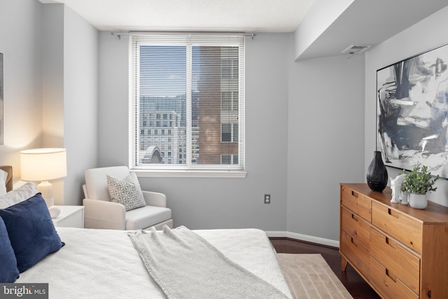 851 N Glebe Rd Unit 1508, Arlington, VA 22203 - bedroom featuring wood finished floors and multiple windows