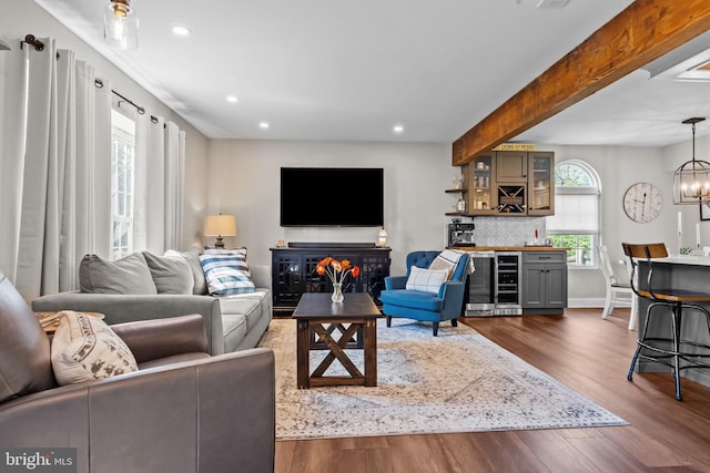 3 Adrian Pl, Newtown, PA 18940 - living room with dark wood finished floors, recessed lighting, a dry bar, beverage cooler, and a chandelier