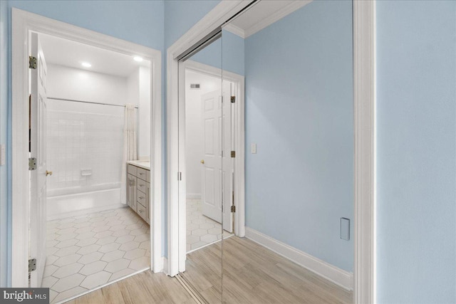 110 Chevy Chase St Unit 301, Gaithersburg, MD 20878 - corridor featuring light wood-type flooring and ornamental molding