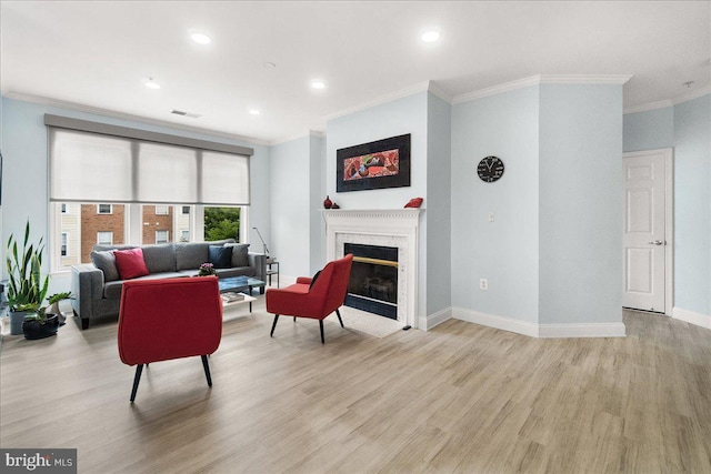 110 Chevy Chase St Unit 301, Gaithersburg, MD 20878 - living room with light wood-type flooring, ornamental molding, a fireplace, baseboards, and recessed lighting