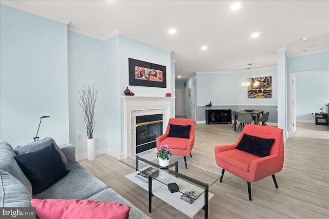 110 Chevy Chase St Unit 301, Gaithersburg, MD 20878 - living room featuring crown molding, a chandelier, light wood-style floors, a fireplace, and recessed lighting