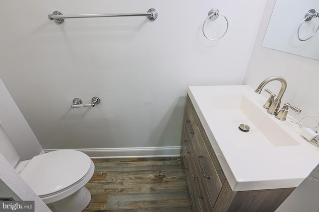 15 Woodenbridge Ct Unit C, Reisterstown, MD 21136 - half bath with vanity and wood finished floors