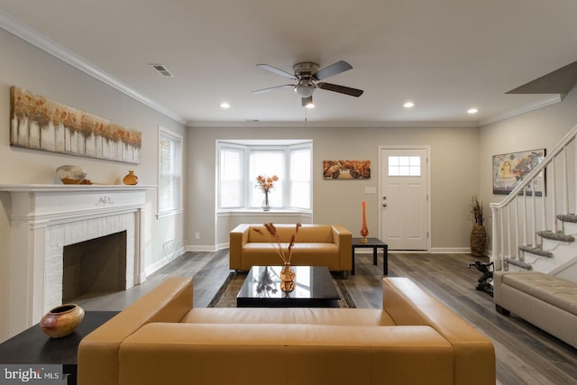 1621 Shadyside Rd, Baltimore, MD 21218 - living room featuring crown molding, wood finished floors, a ceiling fan, stairs, and baseboards