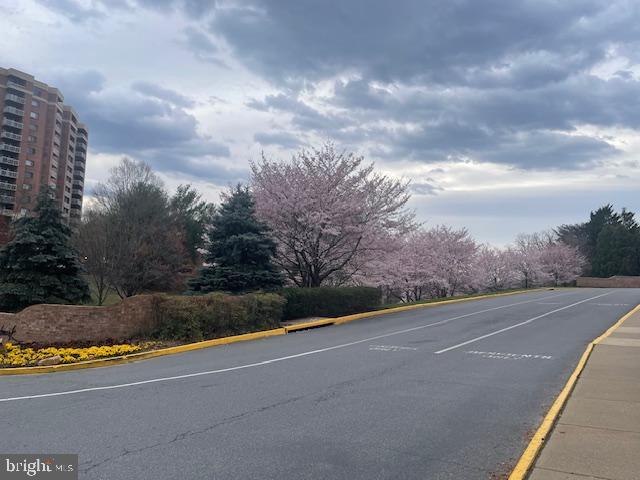 309 Yoakum Pkwy Unit 1809, Alexandria, VA 22304 - view of asphalt road featuring curbs